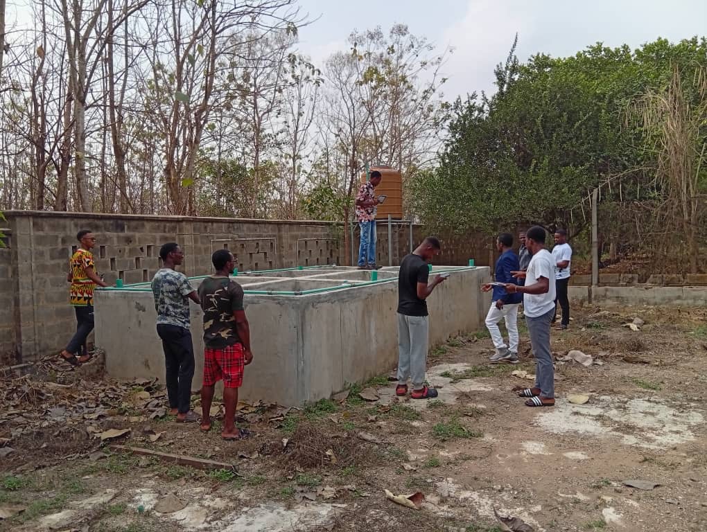 The PDO team with the post-novices at the fish pond