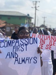 compassion messages on the placard
